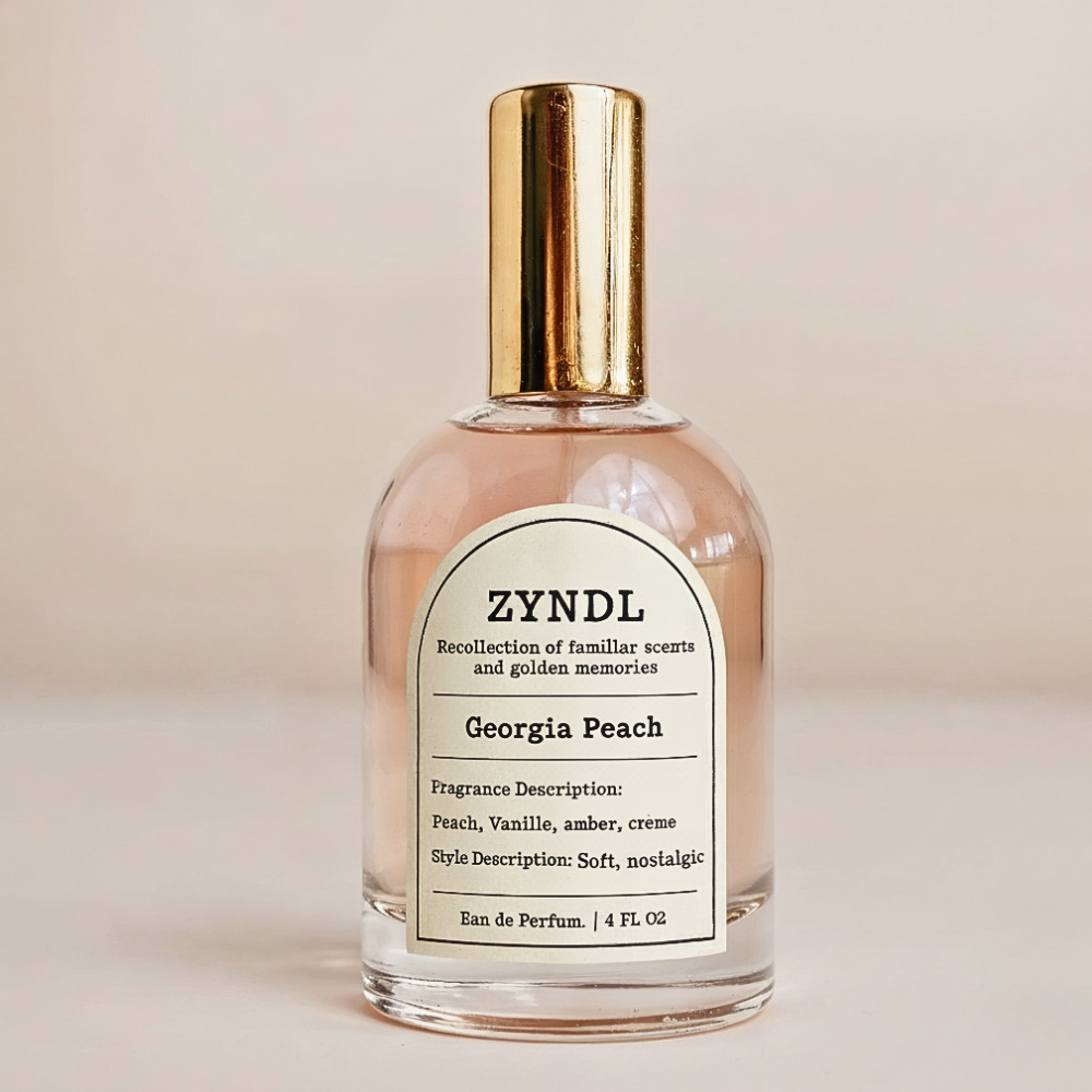 Peach perfume bottle labeled 'ZYNDL Georgia Peach' on a beige background